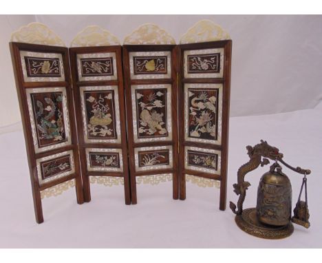 An oriental miniature table screen inlaid with Mother of Pearl dragons and foliage and an oriental brass table bell, screen 2