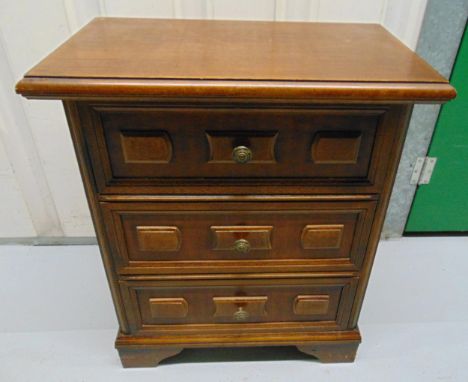 A rectangular mahogany three drawer table top chest of drawers on four bracket feet, 60 x 51 x 30cm