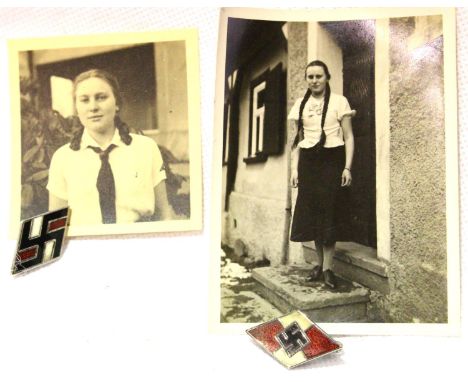 German Third Reich photographs of an unknown female Hitler Youth member, together with two Hitler Youth enamelled pin badges.