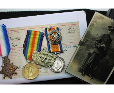 1321 PTE B DOWSE 1 GLOUC R, a British WWI medal trio (the 1914 star being a named replacement), research, photograph and cap 