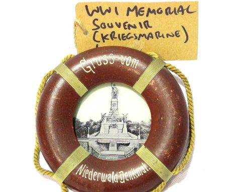 Imperial German Kriegsmarine memorial souvenir leather bound frame in the form of a buoyancy aid, D:13 cm. P&amp;P Group 1 (£