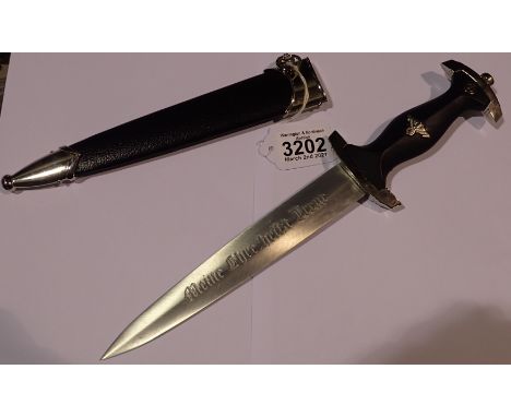 German WWII re-enactment SS parade dagger and scabbard, with engraved blade, the blade L: 21 cm. P&amp;P Group 2 (£18+VAT for