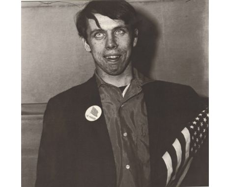 Artist: Diane Arbus (American, 1923-1971). Title: "Patriotic Young Man with a Flag, N.Y.C". Medium: Original vintage photogra