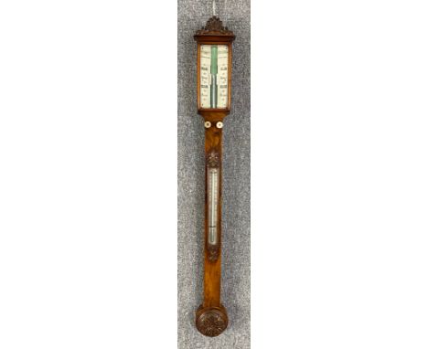 A 19th century carved walnut mercury stick barometer by Gargory, Birmingham. H.99cm