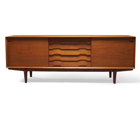 Henry Rosengren Hansen, a teak sideboard manufactured by Skovby Møbler   1960s    With five central drawers, flanked by two s