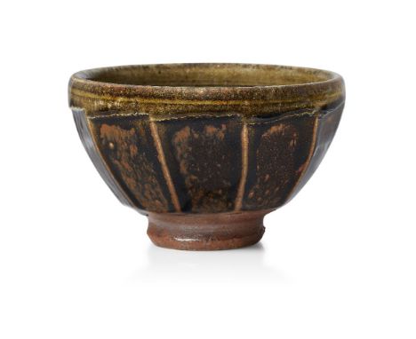Richard Batterham (b.1936), a cut sided bowl c.2000, unsigned A stoneware cut sided bowl glazed tenmoku to the facets with an