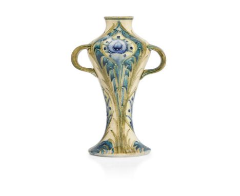 William Moorcroft (1872-1945), a Peacock pattern twin-handled ceramic vase       c.1900, signed in green W Moorcroft, printed