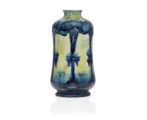 William Moorcroft (1872-1945), a Hazeldene pattern ceramic vase retailed by Liberty & Co      1902-1913, signed in green W Mo