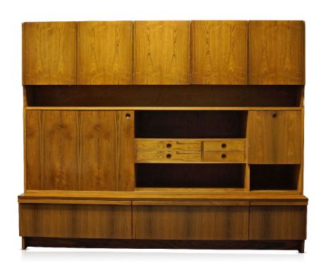 Robert Heritage (b.1927), a rosewood wall unit for Archie Shine Ltd     c.1960s     The top with five cupboard doors, each en