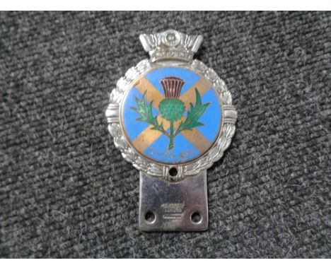 A vintage motor car badge - J.R.Gaunt Thistle 