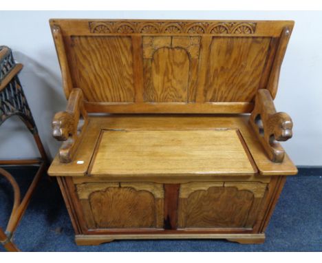 An Edwardian oak monk's bench 