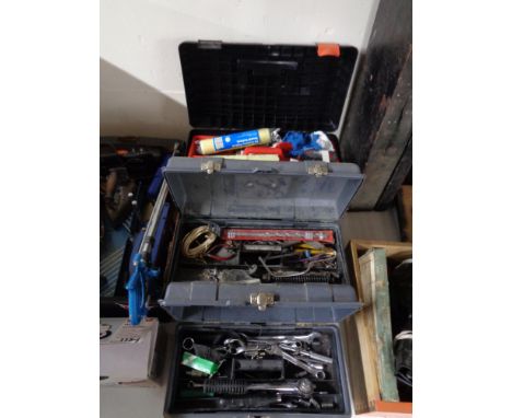 Three plastic tool boxes containing tools 