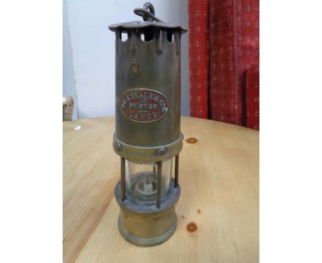 A vintage miner's lamp by W. E. Teal and Co. Swinton Lancashire 