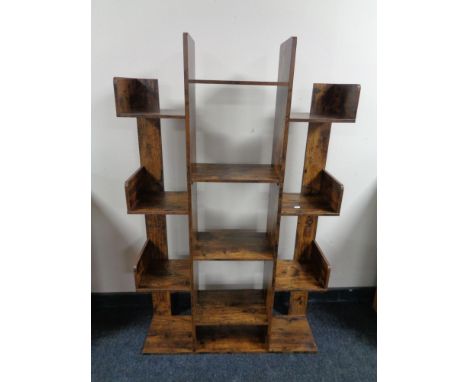 A contemporary wooden shelf / stand 