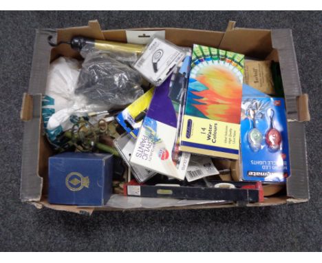 A crate of mini light set, tyre pressure gauge, horse bit etc 
