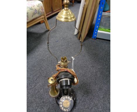 An early 20th century candlestick telephone/lamp  