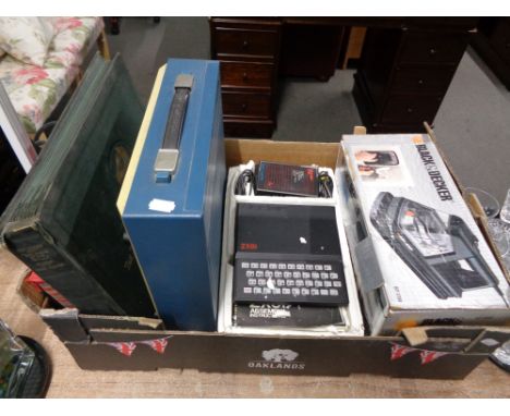 A box of Sinclair ZX-81 console, Black and Decker wall stripper, Imperial Typewriter, folder of vinyl etc 