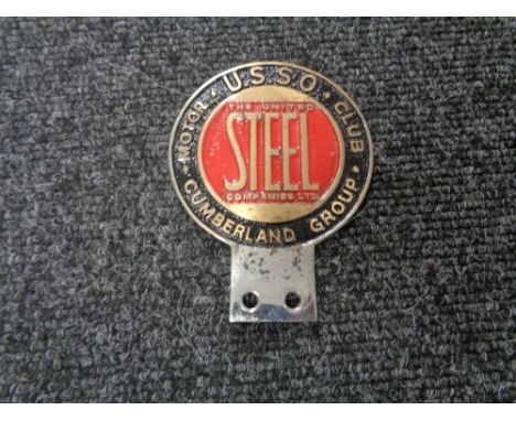 A vintage motor car badge - USSO Cumberland group, United Steel Company.