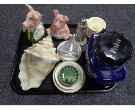A tray of Natwest pigs, Wade money bank, Parker ceramic ink advertising pot, decorative shell