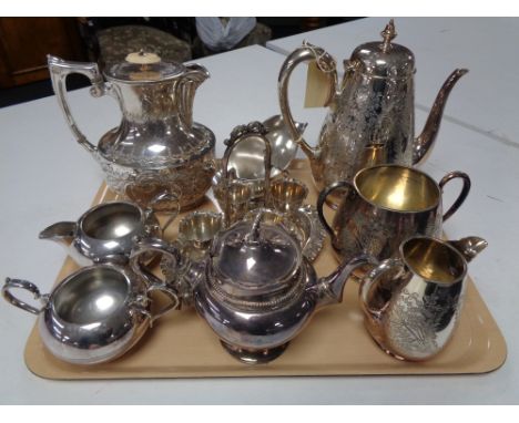 A three piece silver plated tea service, together with various other plated wares, teapot, hot water jug etc. (Q)