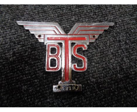 A vintage motor car badge - BTS