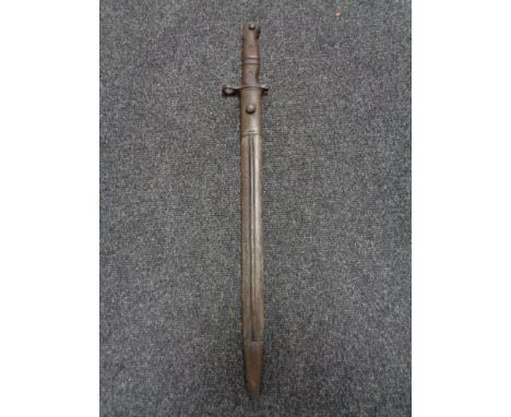 A WW I Remington bayonet in scabbard 