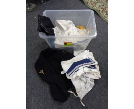 A box of vintage clothing, Navy part uniforms, trousers and jacket etc 