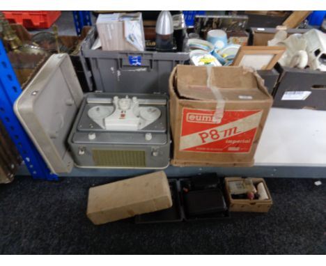 A boxed Continental projector, precision film splicer, reel player etc 