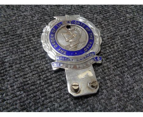 A vintage motor car badge - The order of the knights of the road, presented by the News of the World  