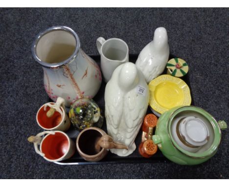 A pair of West German pottery nude mugs together with ceramic dove ornaments etc 