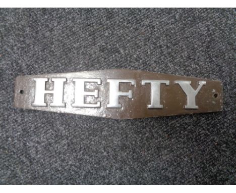 A vintage motor car badge - HEFTY