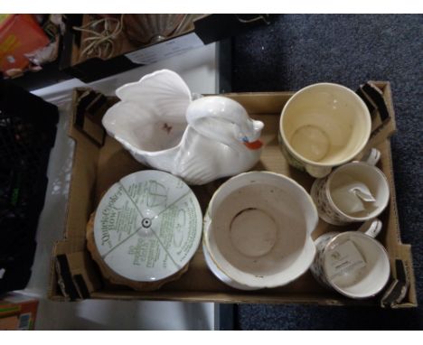 A crate of ceramic swan planter, Wade mug, antique quick cooker bowl etc 