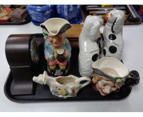 A tray of Staffordshire dog figures, Beswick character jug, oak mantle clock etc 