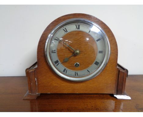 A 1920's oak mantel clock 
