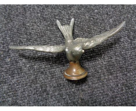 A vintage motor car badge - Swift 