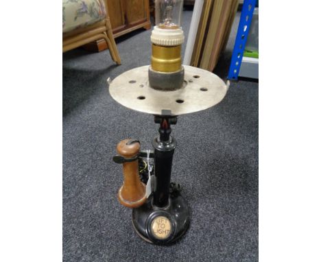 An early 20th century candlestick telephone lamp with later wiring 