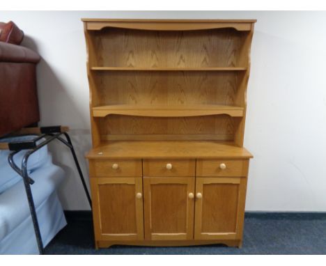 A light oak contemporary kitchen dresser 