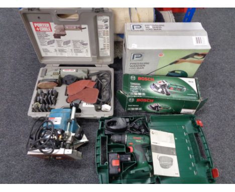 A quantity of power tools, Makita router, pressure washer, Bosch cased drill and angle grinder, cased Porta cable profile san