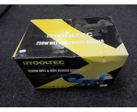 A boxed Tool-tec wet and dry bench grinder 250W