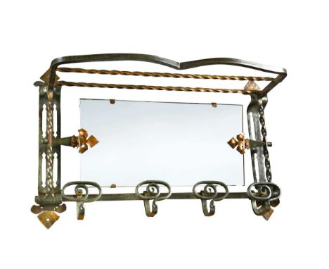 An unusual Art Nouveau 'Pullman' style wrought iron luggage rack, circa 1900, the luggage shelf and uprights with ropetwist f