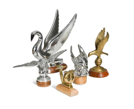 A group of five brass and chrome car mascots, to include a Grand General chrome mascot modelled as a stylised swan, mounted o