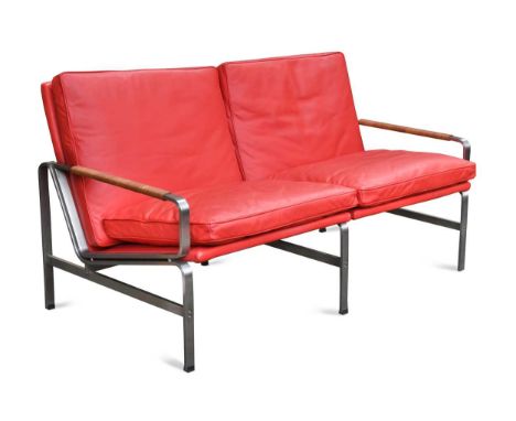 In the manner of Preben Fabricius &amp; Jørgen Kastholm, a two seat sofa,  with red leather cushions and brushed steel frame7