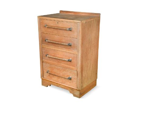 An Art Deco limed oak chest of drawers, with four long graduated drawers each with a wide handle on polished aluminium mounts