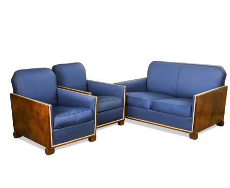 An Art Deco three-piece 'Club' suite, circa late 1920s, comprising a two-seat sofa and pair of armchairs with walnut ends rai