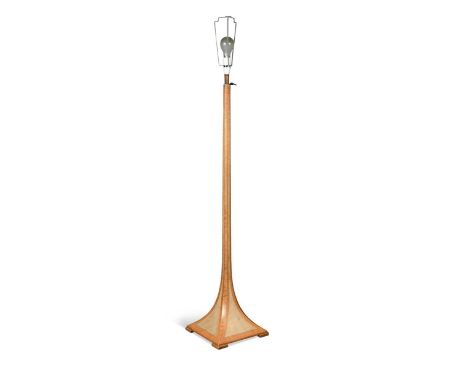 An Art Deco walnut and shagreen standard lamp, in the manner of Clément Rousseau, with telescopic brass adjustment and raised