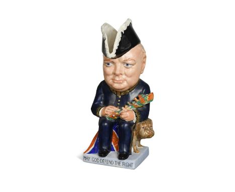 A Clarice Cliff Winston Churchill toby jug, circa 1940, modelled as the First Sea Lord seated on a British bulldog and holdin