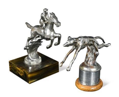 A group of three chromed car mascots, to include an example modelled as a racing greyhound leaping over a fence, on a circula