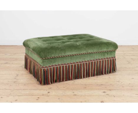 A button-upholstered 'Belgravia' ottoman,of recent manufacture, almost certainly by Peter Dudgeon, with a bullion fringe,109c