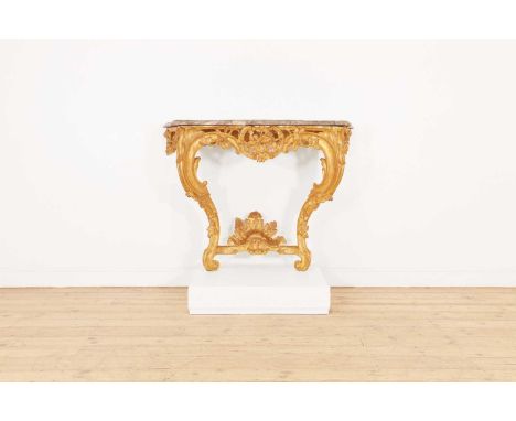 A Louis XV giltwood console table,c.1750, French, of serpentine outline, the grey marble top above a floral and foliate-carve