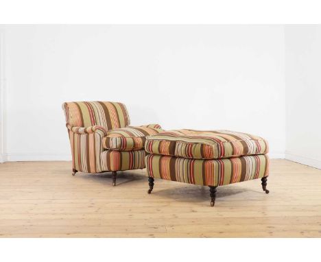An upholstered armchair attributed to George Smith,late 20th century, with striped upholstery, raised on turned front support